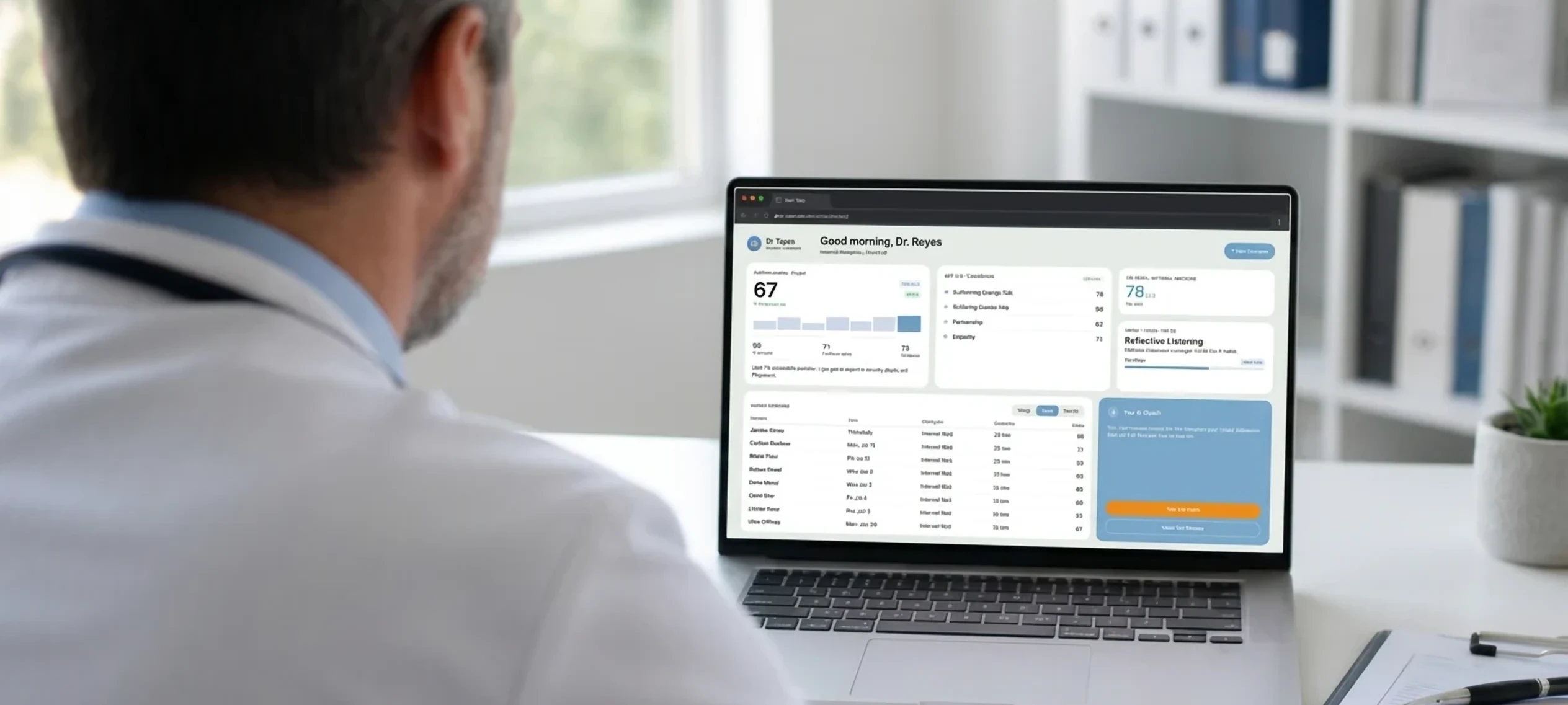 Physician reviewing the Audova™ dashboard on a laptop